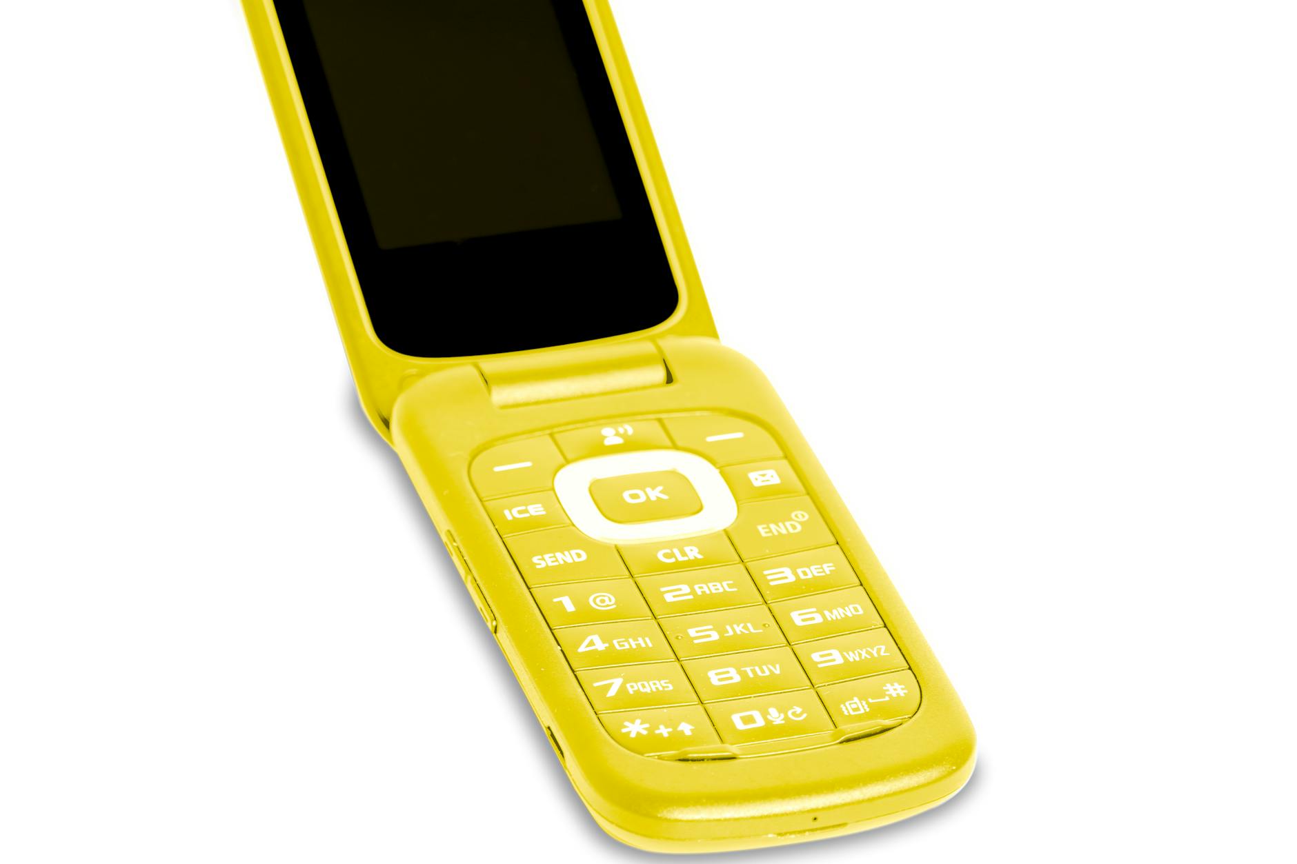 Old flip phone next to a modern smartphone showing the evolution of mobile video