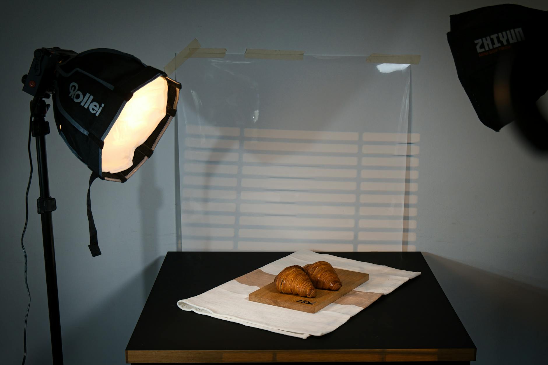 Image with transparent background shown over different colored backgrounds
